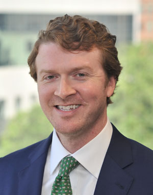 Headshot of attorney Aaron Burke, Esq., vice president of Blackstone Title LLC